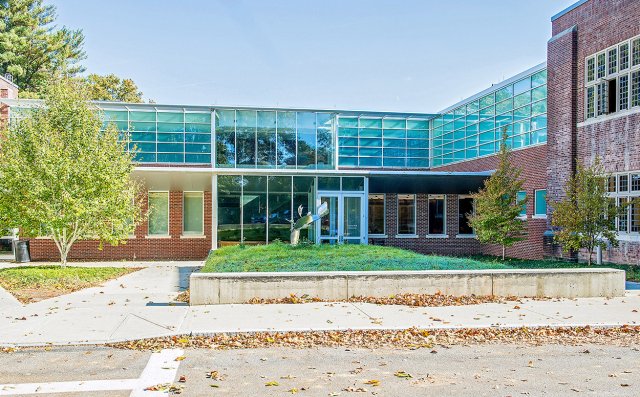 Brick building with large glass windows