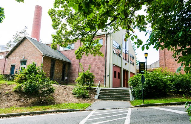 A brick building up a small staircase