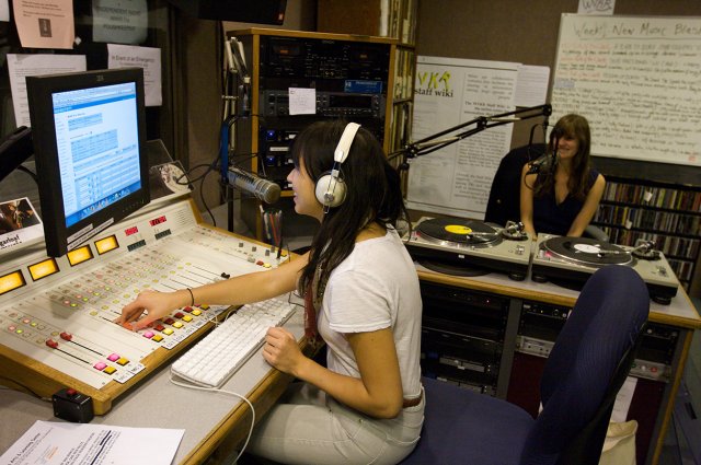 Two students using radio equipment