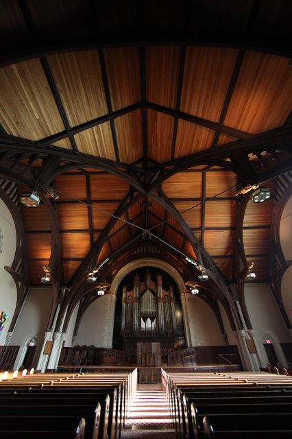 Interior of the chapel, including pews and an organ