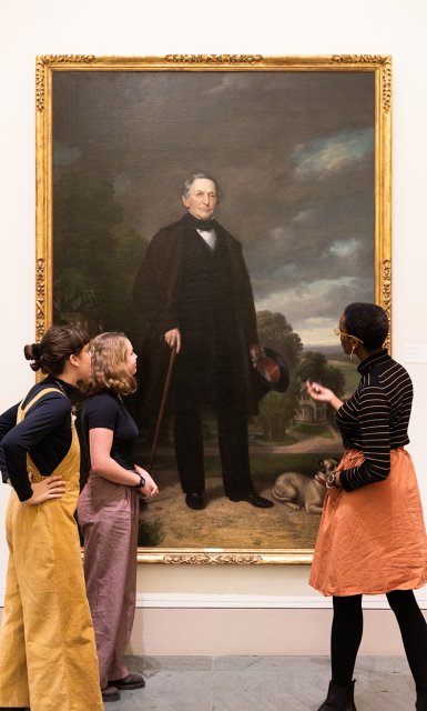 Students viewing a painting